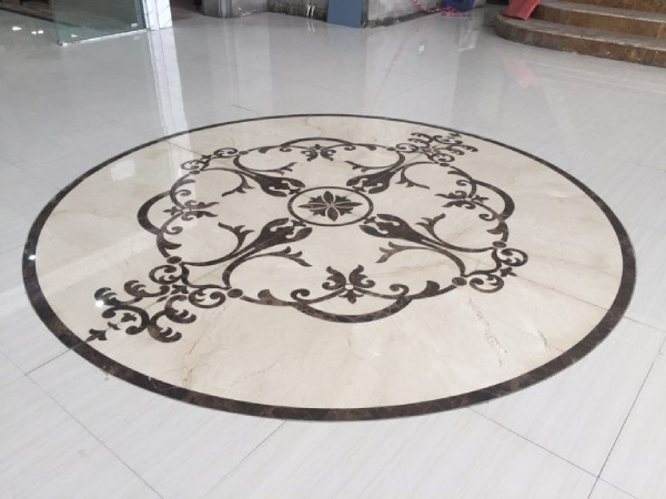 Gạch thảm tròn ít họa tiết thích hợp cho những gia chủ chuộng phong cách phòng khách tối giản