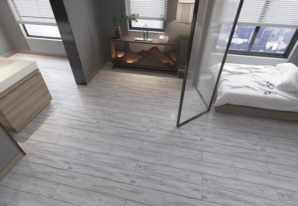 Mẫu gạch giả gỗ lát nền phòng ngủ màu xám trắng giúp không gian thêm mát mẻ