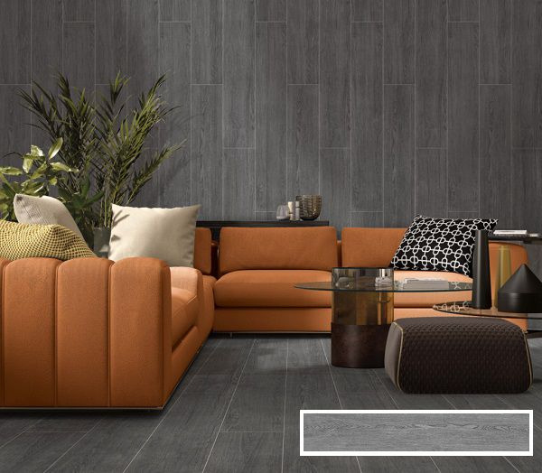 Nền nhà màu xám nhạt nổi bật khi phối cùng bộ sofa màu cam