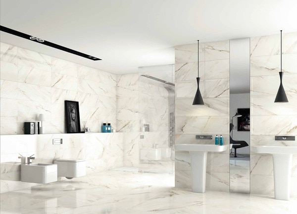 Gạch ốp nhà giả đá vân màu xám mang đến nét đẹp sang trọng cho khu vực phòng tắm nhà bạn